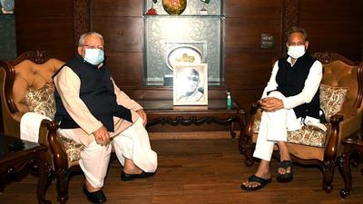 Rajasthan Chief Minister Ashok Gehlot meets Governor Kalraj Mishra at Raj Bhawan in Jaipur on Saturday. (ANI PHOTO.)