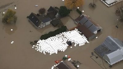 The Royal Canadian Mounted Police confirmed Saturday that the bodies of three men listed earlier as missing have now been found near Duffey Lake, northeast of Vancouver. In picture - Floodwaters surround homes and farms in Abbotsford, British Columbia. (AFP) The Royal Canadian Mounted Police confirmed Saturday that the bodies of three men listed earlier as missing have now been found near Duffey Lake, northeast of Vancouver. In picture - Floodwaters surround homes and farms in Abbotsford, British Columbia. (AFP)