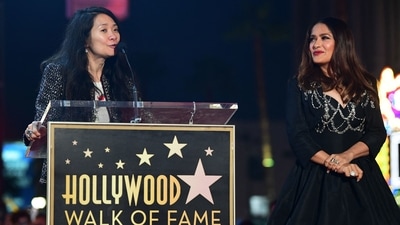 Chinese filmmaker Chloe Zhao (L) speaks during the ceremony. Chloe directed Eternals, which starred Salma. (AFP) Chinese filmmaker Chloe Zhao (L) speaks during the ceremony. Chloe directed Eternals, which starred Salma. (AFP)