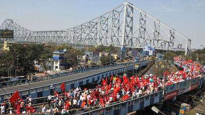 CPI(M) workers participate in a march towards Brigade Parade Ground during a joint rally of the Left Front and Congress, ahead of West Bengal assembly elections, in Kolkata on February 28. (PTI) CPI(M) workers participate in a march towards Brigade Parade Ground during a joint rally of the Left Front and Congress, ahead of West Bengal assembly elections, in Kolkata on February 28. (PTI)