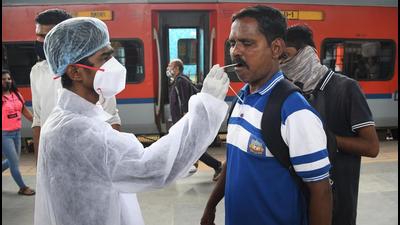 A BMC health worker collects the swab sample of a passenger for Covid test at Dadar station on Saturday. In the past 24 hours, Maharashtra tested 104,739 samples and recorded a positivity rate of 0.79%. (Bhushan Koyande/HT PHOTO) A BMC health worker collects the swab sample of a passenger for Covid test at Dadar station on Saturday. In the past 24 hours, Maharashtra tested 104,739 samples and recorded a positivity rate of 0.79%. (Bhushan Koyande/HT PHOTO)