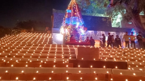 People rode beautifully decorated boats and watched the lights and celebrations on the ghats.(HT Photo/Rajesh Kumar)