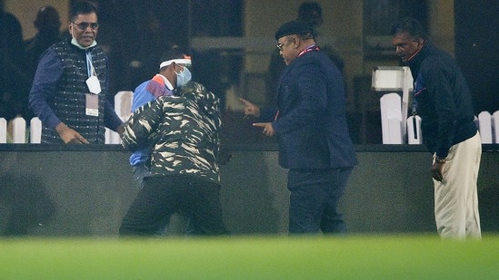 Security people detain a fan after he entered the field during 2nd Twenty20 cricket match between India and New Zealand at JSCA International Stadium Complex in Ranchi, (PTI) Security people detain a fan after he entered the field during 2nd Twenty20 cricket match between India and New Zealand at JSCA International Stadium Complex in Ranchi, (PTI)