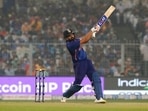 India's captain Rohit Sharma hits a boundary during the third Twenty20 cricket match between India and New Zealand in Kolkata, India, Sunday, Nov. 21, 2021.(AP) India's captain Rohit Sharma hits a boundary during the third Twenty20 cricket match between India and New Zealand in Kolkata, India, Sunday, Nov. 21, 2021.(AP)