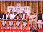 Rajasthan CM Ashok Ghelot and Governor Kalraj Mishra with new cabinet ministers.