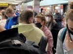 People gather to leave Hartsfield-Jackson Atlanta International Airport after the reported shooting, in Atlanta, Georgia,&nbsp;