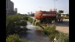 The stormwater drain runs parallel to the main carriageway, linking the national capital to Gurugram. (Yogendra Kumar/HT) The stormwater drain runs parallel to the main carriageway, linking the national capital to Gurugram. (Yogendra Kumar/HT)