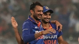 India's Axar Patel, left, and Harshal Patel celebrate the dismissal of New Zealand's Glenn Phillips during the third Twenty20 cricket match between India and New Zealand in Kolkata, India, Sunday, Nov. 21, 2021. (AP Photo/Bikas Das)(AP)
