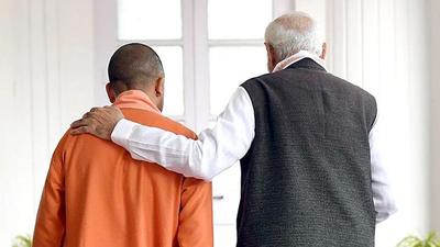 Prime Minister Narendra Modi with Uttar Pradesh chief minister Yogi Adityanath in Lucknow (PTI PHOTO) Prime Minister Narendra Modi with Uttar Pradesh chief minister Yogi Adityanath in Lucknow (PTI PHOTO)