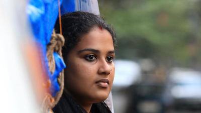 Anupama S Chandran, a former SFI leader, has alleged that her baby boy was secretively given away for adoption by her parents. (Vivek R Nair / HT Photo) Anupama S Chandran, a former SFI leader, has alleged that her baby boy was secretively given away for adoption by her parents. (Vivek R Nair / HT Photo)