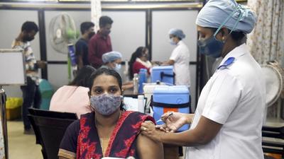 A medic inoculates a dose of Covid-19 vaccine to a beneficiary at Bharatratna Dr Babasaheb Ambedkar Municipal General Hospital, Kandivali, in Mumbai on November 17. (PTI) A medic inoculates a dose of Covid-19 vaccine to a beneficiary at Bharatratna Dr Babasaheb Ambedkar Municipal General Hospital, Kandivali, in Mumbai on November 17. (PTI)