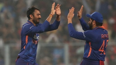 India's Axar Patel and Rohit Sharma celebrates the dismissal during the Third T20 International match between India and New Zealand, at Eden Gardens in Kolkata on Sunday. (ANI) India's Axar Patel and Rohit Sharma celebrates the dismissal during the Third T20 International match between India and New Zealand, at Eden Gardens in Kolkata on Sunday. (ANI)