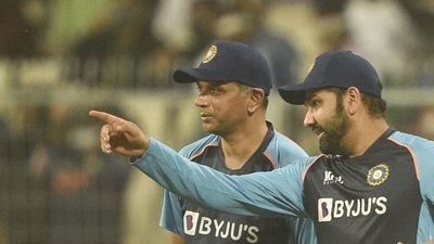 Indian T20 team captain Rohit Sharma with head coach Rahul Dravid during warm up session ahead of their 3rd and final Twenty20 cricket match of the series against New Zealand at Eden Garden in Kolkata, Sunday. (PTI) Indian T20 team captain Rohit Sharma with head coach Rahul Dravid during warm up session ahead of their 3rd and final Twenty20 cricket match of the series against New Zealand at Eden Garden in Kolkata, Sunday. (PTI)