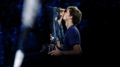 Germany's Alexander Zverev celebrates kissing the trophy after winning his final match against Russia's Daniil Medvedev&nbsp; (REUTERS)