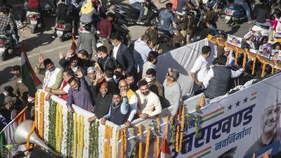 Delhi chief minister and AAP chief at a road show in Haridwar on Sunday. He promised to introduce a free pilgrimage service if his party was voted to power in the Uttarakhand elections next year. (PTI) Delhi chief minister and AAP chief at a road show in Haridwar on Sunday. He promised to introduce a free pilgrimage service if his party was voted to power in the Uttarakhand elections next year. (PTI)