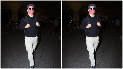 All masked up, Varun posed for the paparazzi. (HT Photos/Varinder Chawla) All masked up, Varun posed for the paparazzi. (HT Photos/Varinder Chawla)