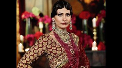 A layered, block coloured bead piece,paired with a silver nath and a beautiful hairdo will make you the talk of the party A layered, block coloured bead piece,paired with a silver nath and a beautiful hairdo will make you the talk of the party