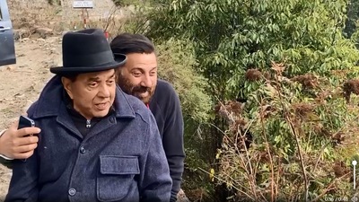 Dharmendra and Sunny Deol enjoy the view in Manali. Dharmendra and Sunny Deol enjoy the view in Manali. 