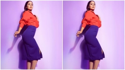 The midriff-baring shirt came with full sleeves and collars and a flattened detail near the waist. (Instagram/@realhinakhan) The midriff-baring shirt came with full sleeves and collars and a flattened detail near the waist. (Instagram/@realhinakhan)