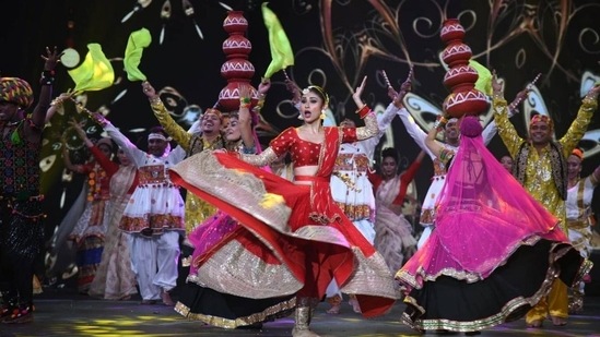 Mouni Roy wore a red costume as she performed at IFFI 2021.
