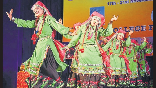 Students participating in a group dance during the PU zonal youth and heritage festival at Khalsa College for Women in Ludhiana on Sunday. (Gurpreet Singh/HT)
