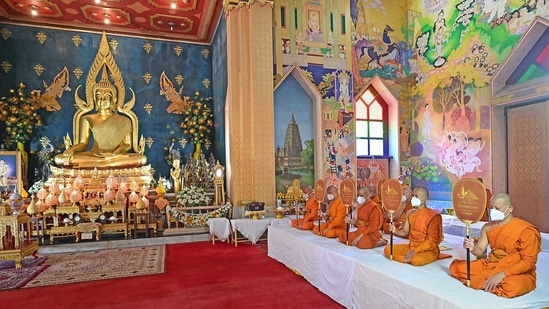 Bodh Gaya: Buddhist monks perform rituals during the robe offering ceremony on the occasion of Kartik Purnima at Wat Thai Temple, in Bodh Gaya&nbsp;