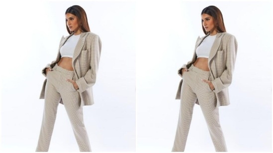 Tara teamed a white cropped top with a pair of white and ivory checkered formal trousers.(Instagram/@tarasutaria)