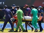 Supportive staff members carry West Indies' player Jeremy Solozano, on stretcher, to an ambulance after being hit by a shot played by Sri Lanka's Dimuth Karunaratne during the day one of the first Test.(AP) Supportive staff members carry West Indies' player Jeremy Solozano, on stretcher, to an ambulance after being hit by a shot played by Sri Lanka's Dimuth Karunaratne during the day one of the first Test.(AP)
