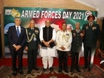 India's defence minister Rajnath Singh, Chief of Defence Staff Bipin Rawat, Army Chief General MM Naravane pose for a group photograph with Bangladesh envoy to India Muhammad Imran and and officers from Armed Forces of Bangladesh during Bangladesh Armed Forces Day event at the Bangladesh High Commission, in New Delhi on Monday. (ANI)