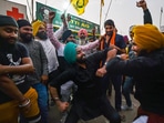 Farmers dance as they celebrate after Prime Minister Narendra Modi announced the repealing of the three central farm laws at the Singhu border in New Delhi. Farmers dance as they celebrate after Prime Minister Narendra Modi announced the repealing of the three central farm laws at the Singhu border in New Delhi. 