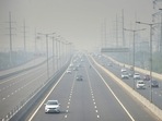 Vehicles ply on Delhi-Meerut Expressway amid low visibility due to a thick layer of smog in Ghaziabad. Vehicles ply on Delhi-Meerut Expressway amid low visibility due to a thick layer of smog in Ghaziabad. 