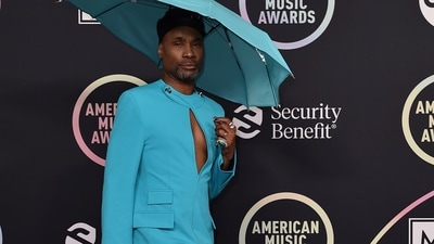 Billy Porter aces the blue umbrella hate look as he arrives at the American Music Awards. (Invision) Billy Porter aces the blue umbrella hate look as he arrives at the American Music Awards. (Invision)