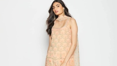 Athiya Shetty was earlier spotted wearing this peach sharara set with side pockets by Anita Dongre. (Instagram/@elevate_promotions) Athiya Shetty was earlier spotted wearing this peach sharara set with side pockets by Anita Dongre. (Instagram/@elevate_promotions)