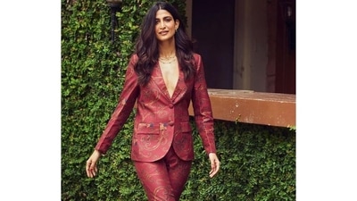 Aahana Kumra goes shirtless to rock a sultry look in ₹20k maroon silk pantsuit (Instagram/dipublicrelations) Aahana Kumra goes shirtless to rock a sultry look in ₹20k maroon silk pantsuit (Instagram/dipublicrelations)