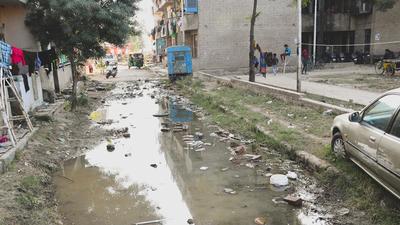 DOWN THE DRAIN: A waterlogged road in Dhanas Rehabilitation Colony, which is part of ward 15 of Chandigarh, on Saturday. (GURTEJ SINGH/HT)