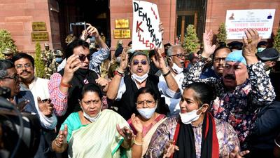 TMC MPs shout slogans during a protest outside the Ministry of Home Affairs over alleged police brutality in Tripura, in New Delhi, on Monday. (ANI)