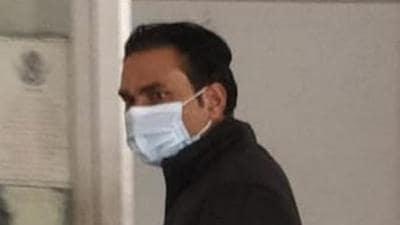Haryana Public Service Commission (HPSC) deputy secretary Anil Nagar, who along with two others was arrested for tampering with the marks of candidates of dental surgeons’ exam, to his office to conduct more searches. (HT Photo)