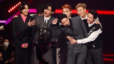 BTS receives an award for Artist of the Year at the 49th Annual American Music Awards at the Microsoft Theatre in Los Angeles, California, US. (Reuters)