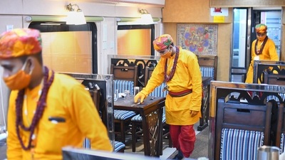 Ujjain Akhada Parishad want the dress code of Ramayan Express' waiters to be withdrawn. The seers claim it is an insult to the Hindu religion. (PTI Photo) Ujjain Akhada Parishad want the dress code of Ramayan Express' waiters to be withdrawn. The seers claim it is an insult to the Hindu religion. (PTI Photo)