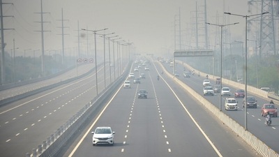 Vehicles ply on Delhi-Meerut Expressway amid low visibility due to a thick layer of smog in Ghaziabad.&nbsp; (PTI Photo)