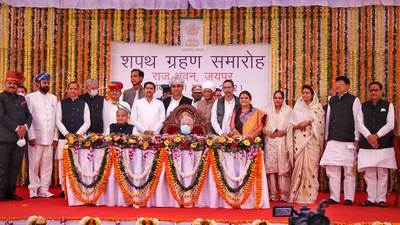 Rajasthan CM Ashok Ghelot and Rajasthan governor Kalraj Mishra pose with new cabinet ministers after the swearing-in ceremony at Raj Bhawan in Jaipur (PTI Photo) Rajasthan CM Ashok Ghelot and Rajasthan governor Kalraj Mishra pose with new cabinet ministers after the swearing-in ceremony at Raj Bhawan in Jaipur (PTI Photo)
