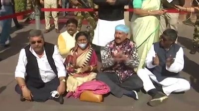 TMC MPs sit on dharna outside MHA over alleged police brutality in Tripura. (ANI) TMC MPs sit on dharna outside MHA over alleged police brutality in Tripura. (ANI)