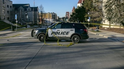 Police block off road entrances following a driver plowing into the Christmas parade in Waukesha, Wisconsin, that left five people dead and dozens injured. (AFP) Police block off road entrances following a driver plowing into the Christmas parade in Waukesha, Wisconsin, that left five people dead and dozens injured. (AFP)