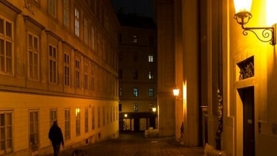A person walks on the street on the evening before the beginning of a nationwide lockdown due to the fast rising Covid-19 infections in the country in Vienna. (AP) A person walks on the street on the evening before the beginning of a nationwide lockdown due to the fast rising Covid-19 infections in the country in Vienna. (AP)