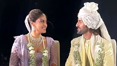 Anushka Ranjan and Aditya Seal sat in a mandap for their Hindu wedding and chatted with each other. Anushka Ranjan and Aditya Seal sat in a mandap for their Hindu wedding and chatted with each other. 