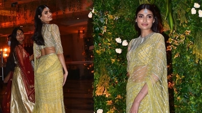 Athiya Shetty attended the sangeet wearing a yellow embellished Falguni Shane Peacock saree. (Varinder Chawla) Athiya Shetty attended the sangeet wearing a yellow embellished Falguni Shane Peacock saree. (Varinder Chawla)