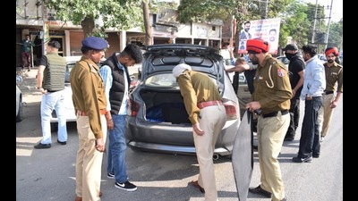 Punjab Police officials checking vehicles in Amritsar i n the wake of the Pathankot grenade attack on Monday. Punjab Police officials checking vehicles in Amritsar i n the wake of the Pathankot grenade attack on Monday.