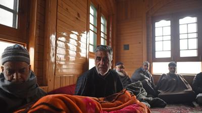 The brother and other relatives of Altaf Ahmad Bhat mourning his death at his home in Srinagar’s Barzulla on Monday. (Waseem Andrabi/Hindustan Times) The brother and other relatives of Altaf Ahmad Bhat mourning his death at his home in Srinagar’s Barzulla on Monday. (Waseem Andrabi/Hindustan Times)