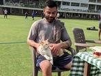 Virat Kohli shares a picture with a cat.(Instagram) Virat Kohli shares a picture with a cat.(Instagram)