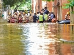 National Disaster Response Force (NDRF) personnel evacuate the residents of Kendriya Vihar from a flooded area in Bengaluru.(PTI) National Disaster Response Force (NDRF) personnel evacuate the residents of Kendriya Vihar from a flooded area in Bengaluru.(PTI)